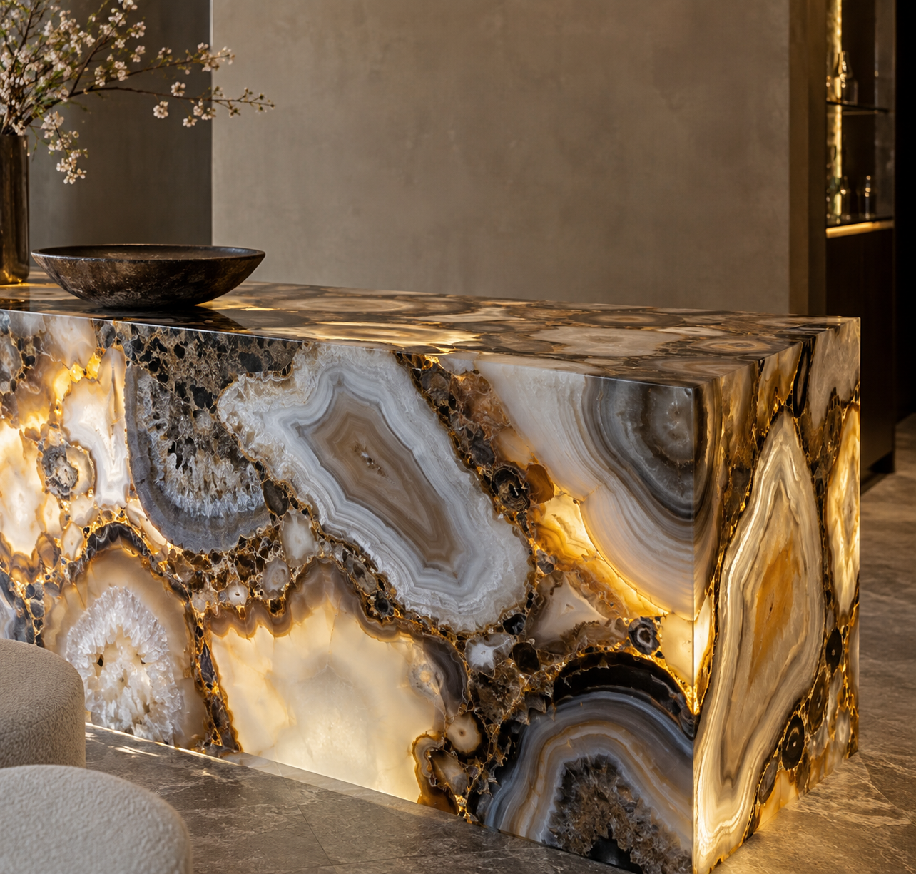 Backlit agate bar, a translucent semi-precious stone, showing natural banding in a Tenetti luxury interior.